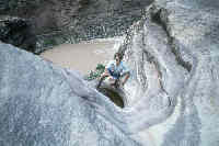 Lance collecting water high above river on bypass